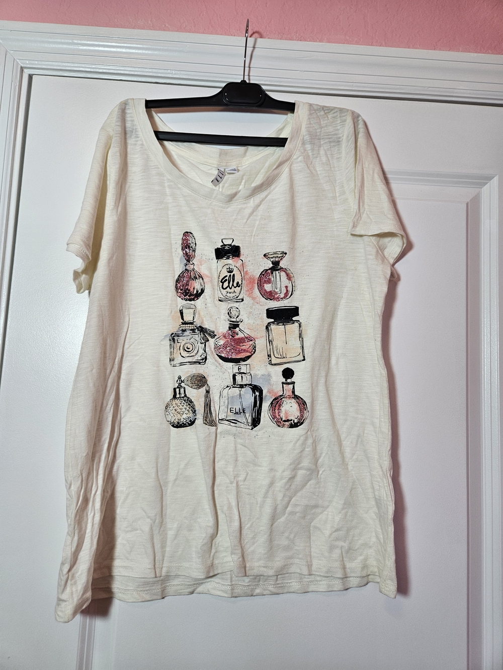 Elle Cream Short Sleeve Tee with Pink and Black Perfume Bottle Graphic